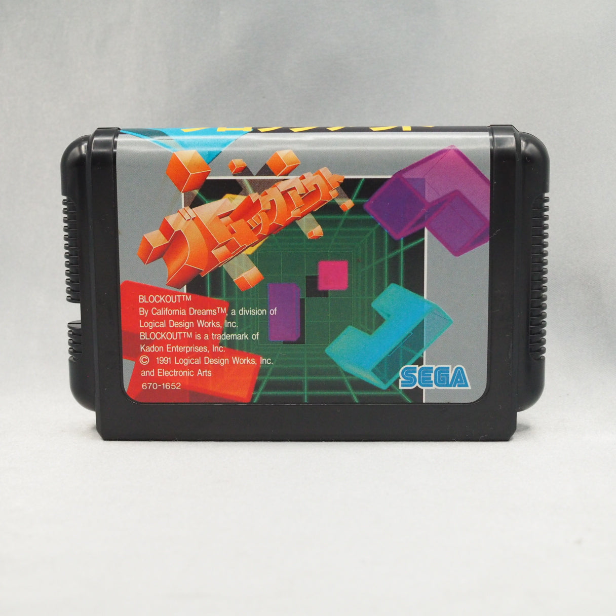 Block Out (1991, Mega Drive) is a 3D falling-block puzzle by California Dreams—rotate polycubes into a pit and clear full lay — photo 2