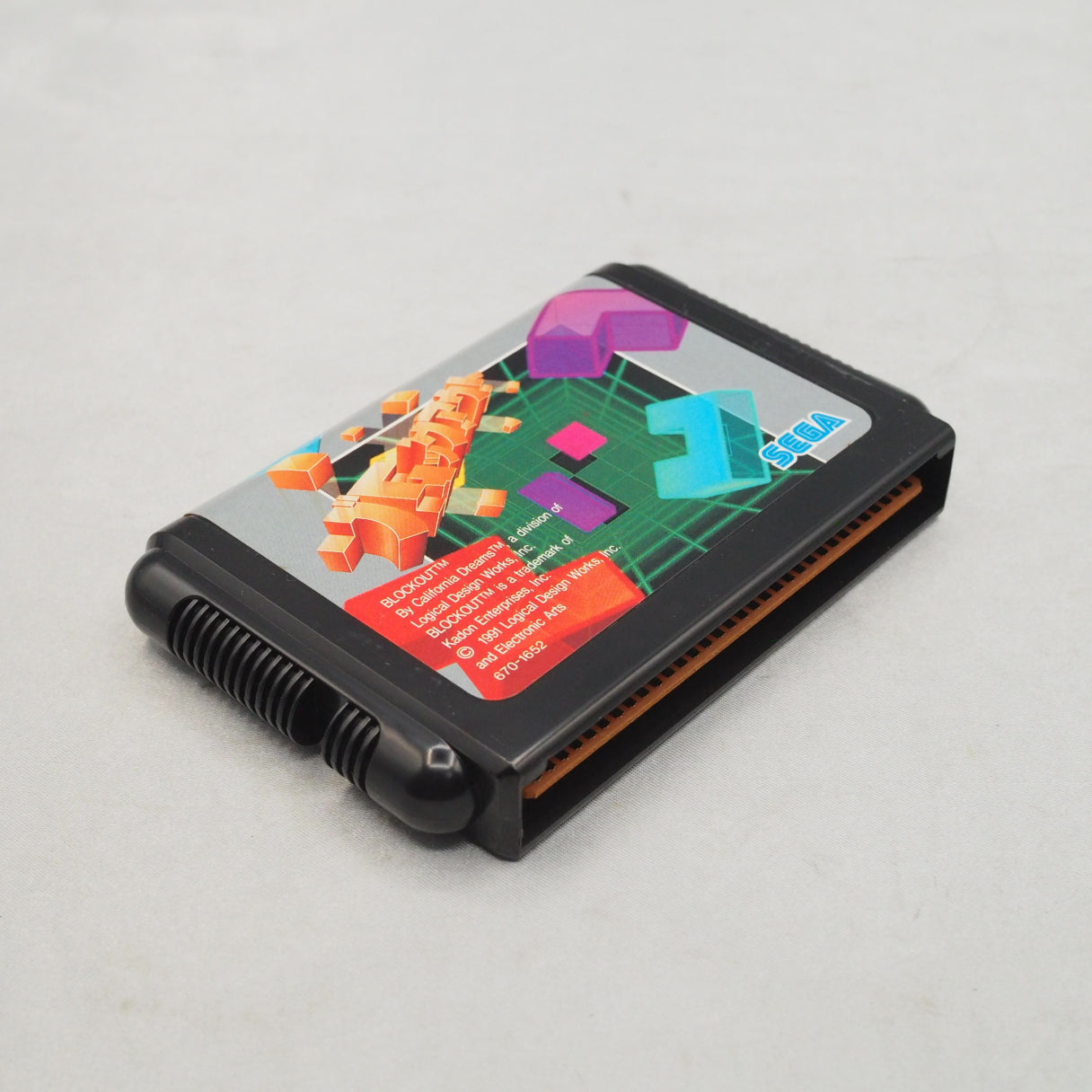 Block Out (1991, Mega Drive) is a 3D falling-block puzzle by California Dreams—rotate polycubes into a pit and clear full lay — photo 4