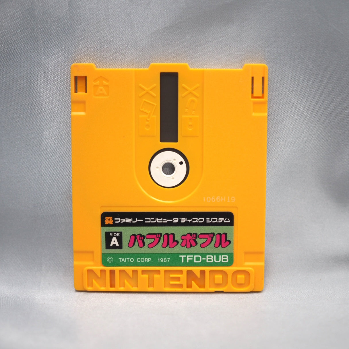 Bubble Bobble (1987) for the Famicom Disk System — Taito's classic two-player bubble-popping platformer with Bub and Bob.