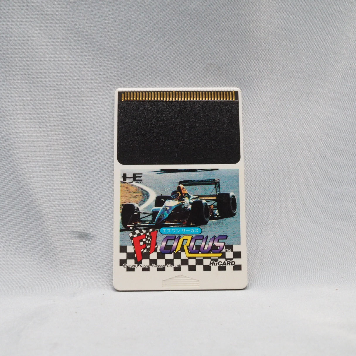 F1 Circus (PC Engine, 1990) launched Nichibutsu's long-running Formula One series. Password saves, overhead racing, internati