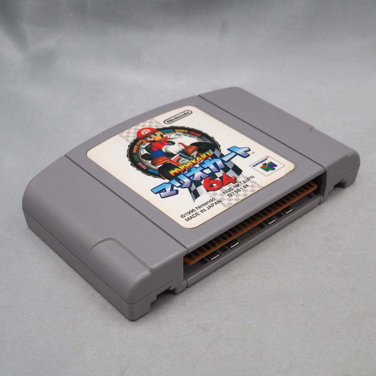 Blue shell targets only human racers, never CPU. Mario Kart 64 (N64, 1996) sold 9.87 million and defined Saturday-night couch — photo 5