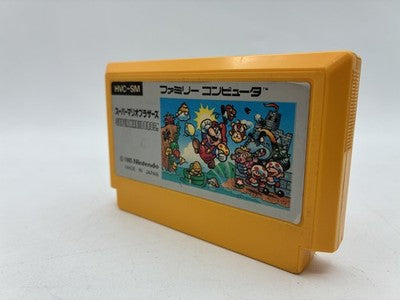 Super Mario Bros. Japanese Famicom original (1985) — 60-pin cartridge, no save battery, region-free gameplay. World 1-1 taugh